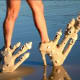 Sand castles and hairy legs. Just unusual beach attire