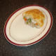 Plating up the chicken and mushroom pie