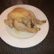 Poached chicken removed from poaching liquid