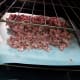 Spread on baking sheet covered with foil or parchment paper. Bake for 15 minutes at 250 degrees.