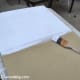 Step 2: Using your paint brush, apply a base coat in the paint color of your choice, in this case, white. Allow to dry completely.