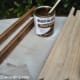 Step 9: Use a rag to apply a coat of wood stain to the frame and trim pieces. Allow the stain to dry, then apply two or three thin coats of satin-finish polyurethane, allowing each coat to dry the recommended time between coats.