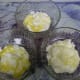 Place yogurt in the bottom of each dessert dish.