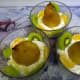 Add the kiwi fruit and orange segments.