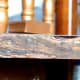 Peg slips through hole and into 2x6 section screwed to rail underneath -
