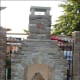 elegant stone fireplace for the patio with raised hearth