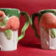 Two flamingo themed cups.