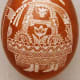 Shepherd motif on scratchwork or etched egg.