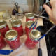 Step Seven: Fill your water bath canner half full of water, then load your jars into the canner.