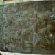 Bas relief representing refugee movements in Vietnam