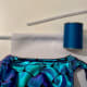 To use a fatter or flatter wire - such as boning - sew a 1/4" casing or channel with right sides out to fit a pipe cleaner or even a doubled pipe cleaner. Insert the wire after the casing is sewn. I've done a doubled pipe-cleaner successfully.