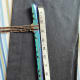 Determine the stretch of your fabric, the size of your neck, and cut your stretch tube the needed length.