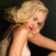 medium length curly hairstyle on blonde colored hair
