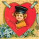 Cute kids: little boy in red heart with blue flowers