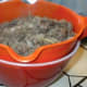 Drain the fat from the meat mixture in colander into a bowl.