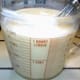 Now add milk up to the quart line on the cup and whisk the milk into the egg-yogurt mixture until well blended.