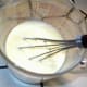 Whisk the yogurt and eggs until well blended.