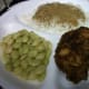 Fried cubed steak, baby lima beans, and rice with milk gravy.