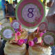 Sophie used several sizes of the cupcake topper art and then customized it in a graphics program to create toppers and table displays