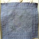 This is actually the back of a quilt that is not whole cloth, but the simple running stitches show that you do not need elaborate patterns or fabric to make a beautiful quilt.