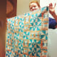 This quilt looks like it is pieced, but it is actually made from a fantastic vintage cheater cloth.