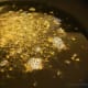 Season oil with mustard seeds, cumin seeds and fenugreek seeds
