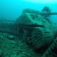 military-warship-tank-airplane-graveyard-under-the-sea-sunken-wwii-hardware