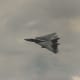 An F-14 with its wings swept back.