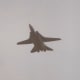 An F-14 with wings extended.