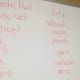 Word bank on the board for fill-in-the-blank worksheet on human babies