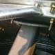 Vice grips are removed in preparation for installing the next sheet.