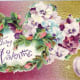 Free vintage valentine greeting card with hearts made of pansies and pink rosebuds; hammered tin background