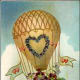 Victorian valentine card with hot air balloon filled with flowers