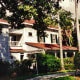 View of Edison home and partial view of guest house