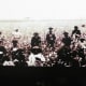 Image of families working in the fields together from the African American Lives 2 documentary.