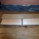 Cut V in skirting board to bend round slight curve and 3mm plywood as filler for lower part of skirting against the wall.