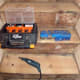 A Dremel with the mini drum sander for the very edges and corners