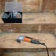 A SoniCrafter with sanding attachment for the corners