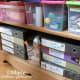 The bottom of this solid wood bookcase may look messy with all the craft stash but the whole front is covered with fabric to make it look tidy.