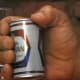 A 12 oz. Canadian Molson in the hand of Andre the Giant.