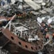 Rescuers working at the damaged Sayano-Shushenskaya dam. (AP Photo)