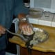 You will need a way to grind the wheat. Kosta is using a meat grinder made in the 1800's that's been in one of our families for generations. If you are smart, you will buy a high quality electric grinder such as the one I showed you in the last modu
