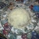 Now the mound is covered and needs the powdered sugar to coat it.