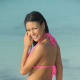 Angie looks gorgeously sexy wearing this Pink bikini with ties at the neck and back. The seamed scrunch bottom adds shape and contours while the over the shoulder pose captures her vivacious smile marvelously.