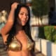 Piel Dorado!...Angie is the real "Golden Girl" and has the bikini to prove it!...vivacious smile illuminates this beautiful models Gold metallic bikini with bold hand-sewn stitches superbly.