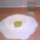 Combine 3 cups of flour, 2 teaspoons of sea salt, 2 tablespoons of olive oil and 1 1/2 cup of lukewarm water to form a dough.