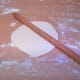 On a floured surface, roll the first into a circle approx. 20Cm diameter.