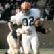 Jim Brown, Cleveland Browns 1963 - 1,863 yards.