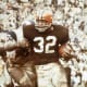 Cleveland Browns Hall of Fame running back Jim Brown runs against the Los Angeles Rams in a 42-7 loss at the Los Angeles Coliseum on 12/12/1965. (Photo by Darryl Norenberg/NFL)