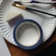Paint brush, toothbrush, sponge, paper plate and painters tape